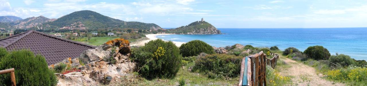 Case Sul Mare Residenze Di Bes Chia Exterior foto