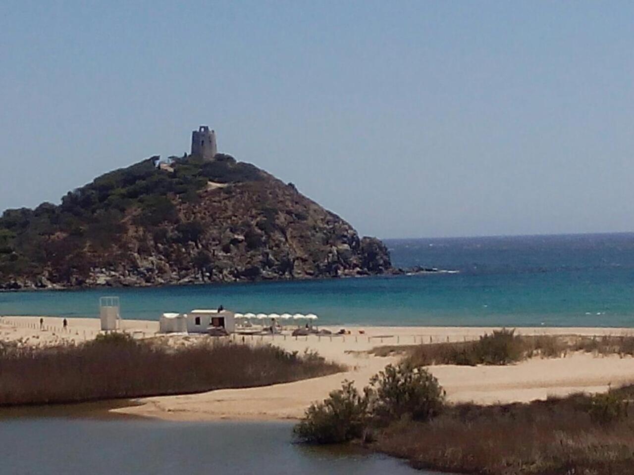 Case Sul Mare Residenze Di Bes Chia Exterior foto